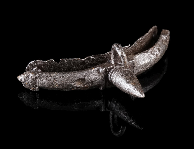 A ROMANO-GERMANIC IRON PRICK SPUR
Circa 2nd-4th century AD.
Spur with central ...