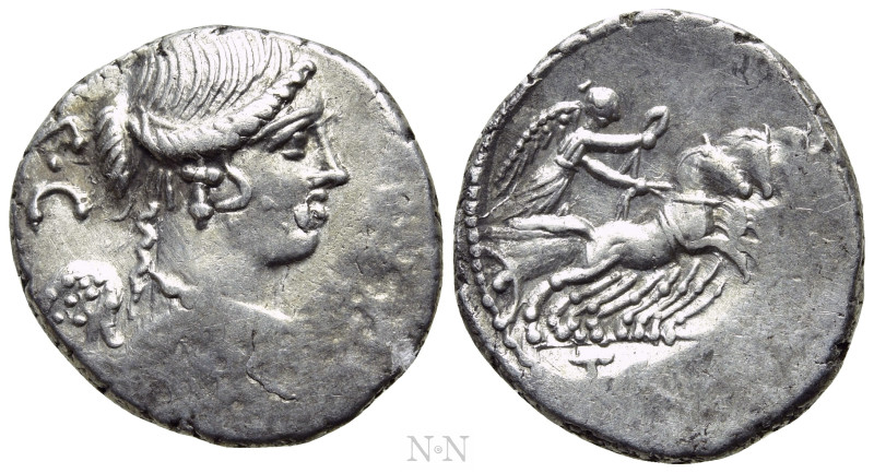 T. CARISIUS. Denarius (46 BC). Rome. 

Obv: S C. 
Draped and winged bust of V...