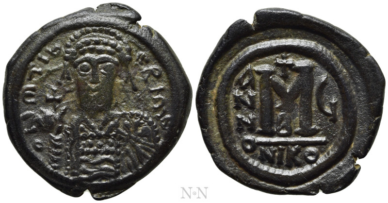 MAURICE TIBERIUS (582-602). Follis. Nicomedia. Dated RY 6 (585/6). 

Obv: O N ...