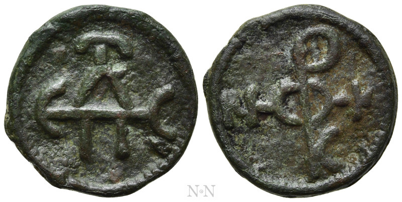 NICEPHORUS II PHOCAS (963-969). Ae. Cherson. 

Obv: Cruciform monogram.
Rev: ...