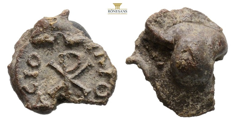 LATE ROMAN LEAD BULLA SEAL WITH CHI-RHO. Late Roman or Early Byzantine, circa 4t...