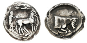 Greek Coins
Sicily
Gela - Tetradrachm 420-415 BC - Obverse: Charioteer, holding kentron in right hand and reins in left, driving slow quadriga right...