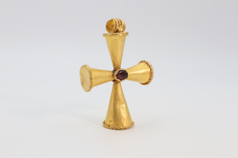 A gold cross pendant comprising four expanding -conical arms each with wired dec...