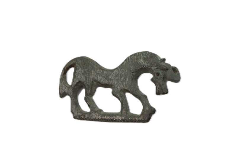 A bronze brooch formed as grazing horse on right ; pin on the reverse is absent,...