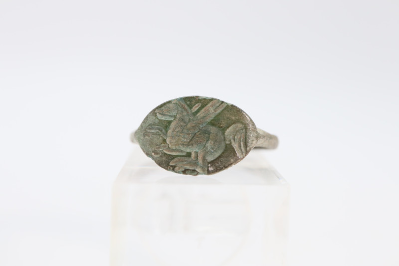 Bronze finger ring with an oval-conical bezel with the image of Pegasus with ope...