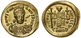 Justinian (527 –565), gold Solidus, Constantinople, officina A, D N IVSTINIANVS P P AVC, helmeted bust three quarters facing, holding spear and shield...