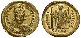 Justinian (527 –565), gold Solidus, Constantinople, officina Є, D N IVSTINIANVS P P AVC, helmeted bust three quarters facing, holding spear and shield...
