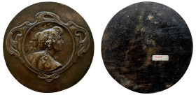 France, large uniface bronze medal by Adolphe Rivet (1855-1925), female bust right, seen partly from behind, with hair tied behind in bun and adorned ...