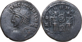 Uncertain Germanic tribe. Pseudo-Imperial coinage. AE, Barbaric imitation. Obv. Helmeted and cuirassed bust left, with shield and spear. Rev. Two Vict...