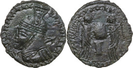 Uncertain Germanic tribe. Pseudo-Imperial coinage. AE, Barbaric imitation. Obv. Helmeted and cuirassed bust left, with shield and spear. Rev. Two Vict...