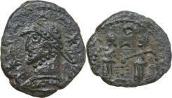 Uncertain Germanic tribe. Pseudo-Imperial coinage. AE, Barbaric imitation. Obv. Helmeted and cuirassed bust left, with shield and spear. Rev. Two Vict...