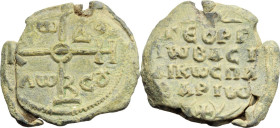 Lead Seal of George Basilikos (proto)spatharios, 8th century. Obv. Cruciform invocative monogram: Θεοτόκε βοήθει. Letters in the quarters: τῷ δούλῳ σο...
