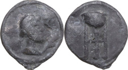 Leads from Ancient and Medieval World. PB Tessera. D/ Head right; below chin, branch. R/ Tripod. PB. 3.7 g. 17 mm. About VF.