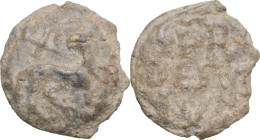 Leads from Ancient and Medieval World. PB Tessera. D/ Agnus Dei right, head left. R/ Inscription in three lines. PB. 4.86 g. 17 mm.