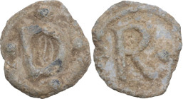 Leads from Ancient and Medieval World. PB Tessera. D/ D surrounded by four pellets. R/ R flanked by two pellets. PB. 1.49 g. 13 mm.
