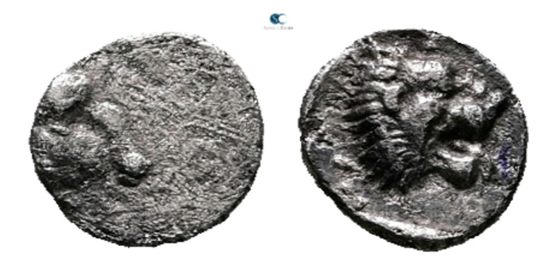 Caria. Uncertain mint circa 450-400 BC. 
Tetartemorion AR

6 mm, 0,24 g


...