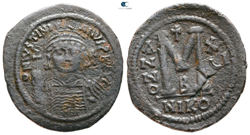 Justinian I AD 527-565. Nikomedia
Follis or 40 Nummi Æ

40 mm, 19,33 g


...