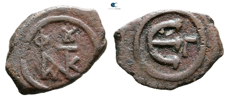 Justin II AD 565-578. Constantinople
Pentanummium Æ

18 mm, 1,79 g



Nea...