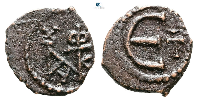 Justin II AD 565-578. Theoupolis (Antioch)
Pentanummium Æ

14 mm, 1,51 g

...