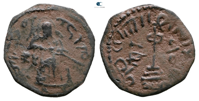 Umayyad. Halab mint. Abd al-Malik AH 65-86. 
Æ Fals

21 mm, 3,17 g



Goo...