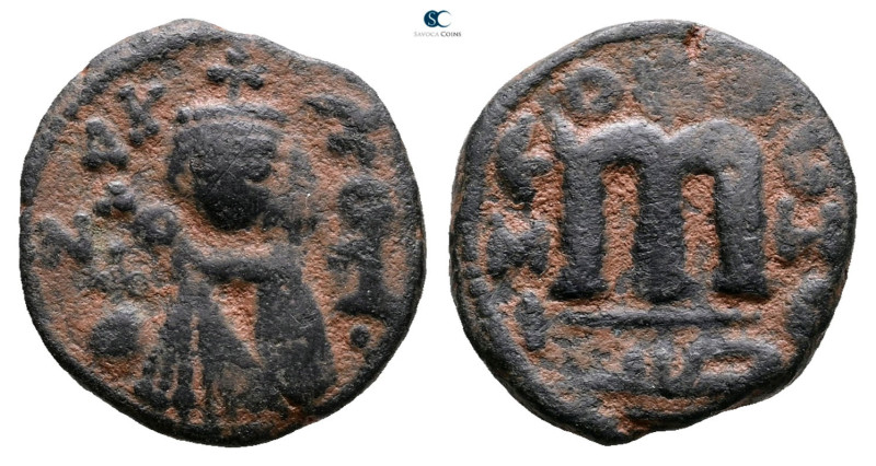 Arab-Byzantine . Hims (Emesa) mint. Mu'awiya I ibn Abi Sufyan AH 661-680. 
Æ Fa...