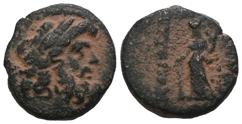 Greek bronze coin. Artificial sandpatina. Weight 4,48 gr - Diameter 14 mm.