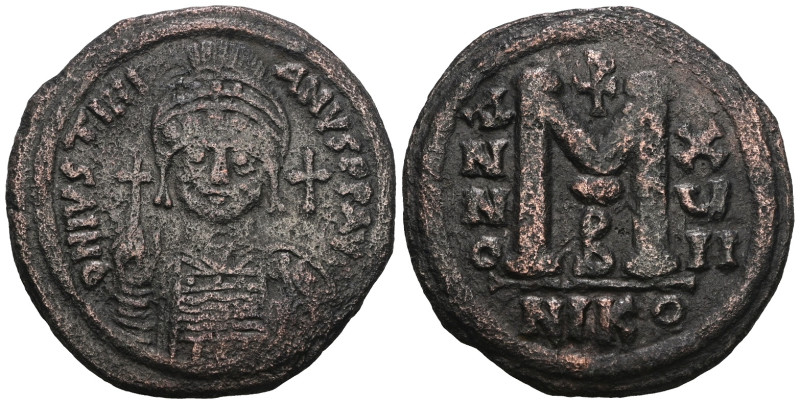 JUSTINIAN I. 527-565 AD. Æ Follis. Weight 18,60 gr - Diameter 32 mm.