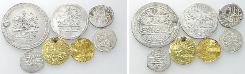 7 Ottoman Coins. 

Obv: .
Rev: .

. 

Condition: See picture.

Weight: ...