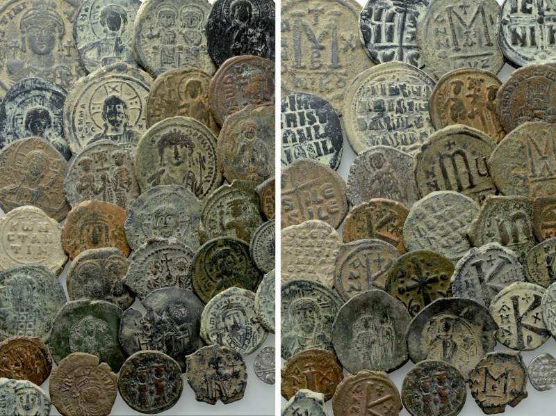 32 Byzantine Coins. 

Obv: .
Rev: .

. 

Condition: See picture.

Weigh...