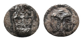 CILICIA. Uncertain. Obol (4th century BC).
Obv: Janiform head, male on left, female on right.
Rev: Three faced bearded head.
SNG Levante 201-2.
Ve...