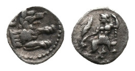 LYCAONIA. Laranda. Obol (Circa 324/3 BC).
Obv: Baal seated left on throne, holding grain ear, grape bunch and sceptre.
Rev: Forepart of wolf right; ...