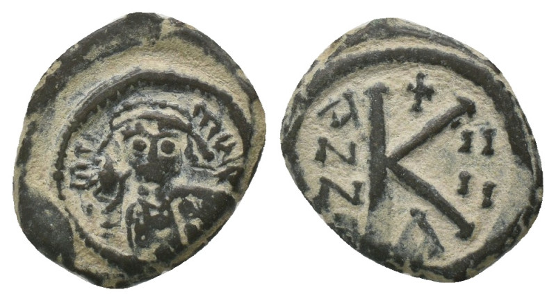 MAURICE TIBERIUS (582-602). Half Follis. Constantinople. Dated RY 4.
Obv: Crown...