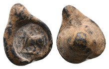 Byzantine Lead Seal. Uncertain
Condition: Very fine.
Weight: 7.59 g.
Diameter: 18.43 mm.