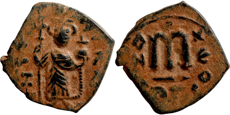 Constans II, Follis, Constantinople. Obverse: Imperial figure holding cross and ...