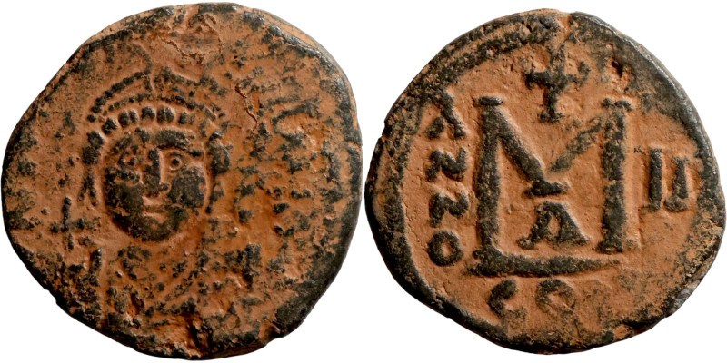 Maurice Tiberius, Follis. Constantinople. Obverse: Armoured facing bust holding ...