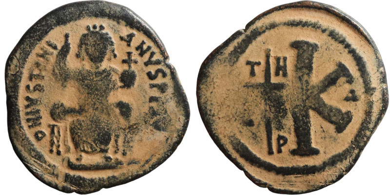 Justinian I. Half Follis. Antioch . Obverse: Justinian on throne. Reverse: Large...