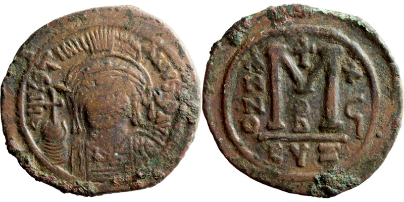 Justinian I, Follis Cyzicus, Obverse: D N IVSTINIANVS PP AVG, armoured facing bu...