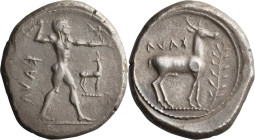 Bruttium, Caulonia. Stater; Bruttium, Caulonia; c. 475-425 BC, Stater, 7.97g. HN-2046, BM-18. Obv: Apollo advancing, stag before. Rx: Stag r., sapling...