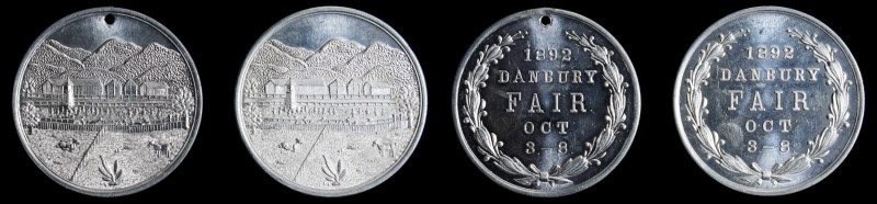 Lot of (2) 1892 Danbury, Connecticut Fair Medals. Aluminum. Mint State.
39.5 mm...