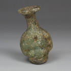Roman janiform bottle, Ex CHRISTIE'S