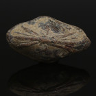 Greek sling bullet with fulmen (thunderbolt) and monogram
