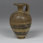 Greek, Proto-Corinthian piriform aryballos depicting bands and running dogs
