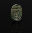 Egyptian scarab with kheper-beetle, men-sign, corrupted reading for “Men-kheper” = Men-kheper-Re? (prenomen of Thutmosis III)