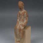 Greek statuette of a seated woman