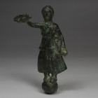 Roman statuette of Victory with wreath on globe