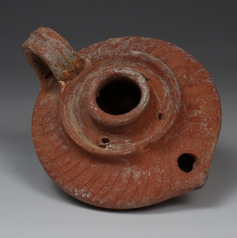 ITEM: Oil lamp, Type Waage 60a
MATERIAL: Pottery
CULTURE: Islamic
PERIOD: 7th...