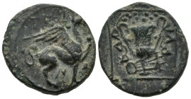 IONIA. Teos. (Circa 370-300 BC)
AE Bronze (13,1mm 2,2g)
Obv: Griffin seated right, left forepaw raised.
Rev: Kantharos above lyre within linear bor...