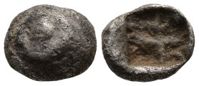 ASIA MINOR. Uncertain mint (probably Caria). (6th century BC)
AR Hemiobol (6,7mm 0,24g)
Obv: Spiral pattern.(human eye).
Rev: Quadripartite incuse ...