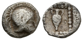 TROAS. Uncertain. (5th century BC)
AR Tetartemorion (5,9mm 0,2g)
Obv: Crested Corinthian helmet right.
Rev: Amphora within dotted square.
SNG Arik...