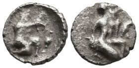 CILICIA, uncertain mint. (4th century BC)
AR Hemiobol (7,4mm 0,31g)
Obv: Herakles kneeling right, drawing bow
Rev: Female figure seated right, on t...